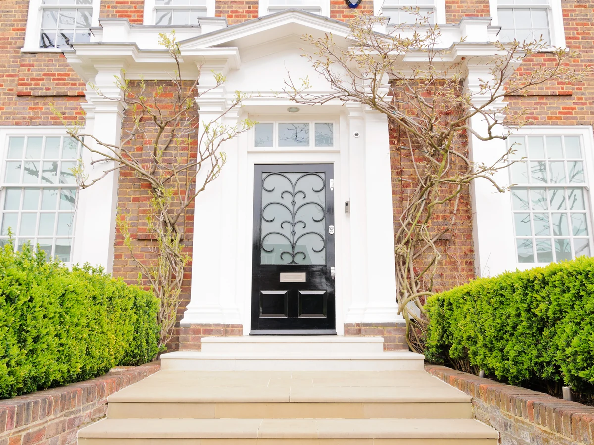 Exterior house painting in Derby, large red brick property