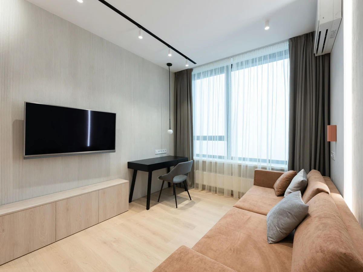 Kitchen cabinet painting in Derby - large white kitchen professionally painted by Derby Painters