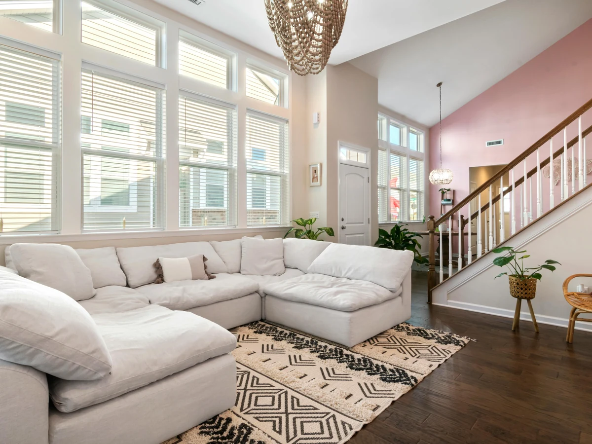 Professional painter rolling interior walls in an Derby property